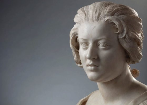 Il dettaglio del volto nel Busto di Costanza Bonarelli (1636–1637) di Gian Lorenzo Bernini rivela un grado di immediatezza psicologica senza precedenti nella ritrattistica barocca. Le labbra leggermente dischiuse, lo sguardo asimmetrico e le guance modellate con morbidezza suggeriscono un istante colto in sospensione, come se la figura stesse per parlare o voltarsi. Bernini abbandona l’idealizzazione a favore di un naturalismo vivido: il respiro irregolare suggerito dalla bocca, la tensione vigile degli occhi e la sottile animazione della carne trasmettono una presenza intima, quasi privata. Il volto appare vivo, animato da una coscienza interiore più che costruito per una posa da ritratto scolpito. Busto di Costanza Bonarelli (dettaglio), circa 1637–1638. Marmo, altezza 74,5 cm, © Museo Nazionale del Bargello, Firenze